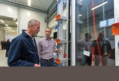 Dr. Peter Mrosik, owner and CEO of profine (left), with workshop manager Thomas Schuster at a newly installed test rig.